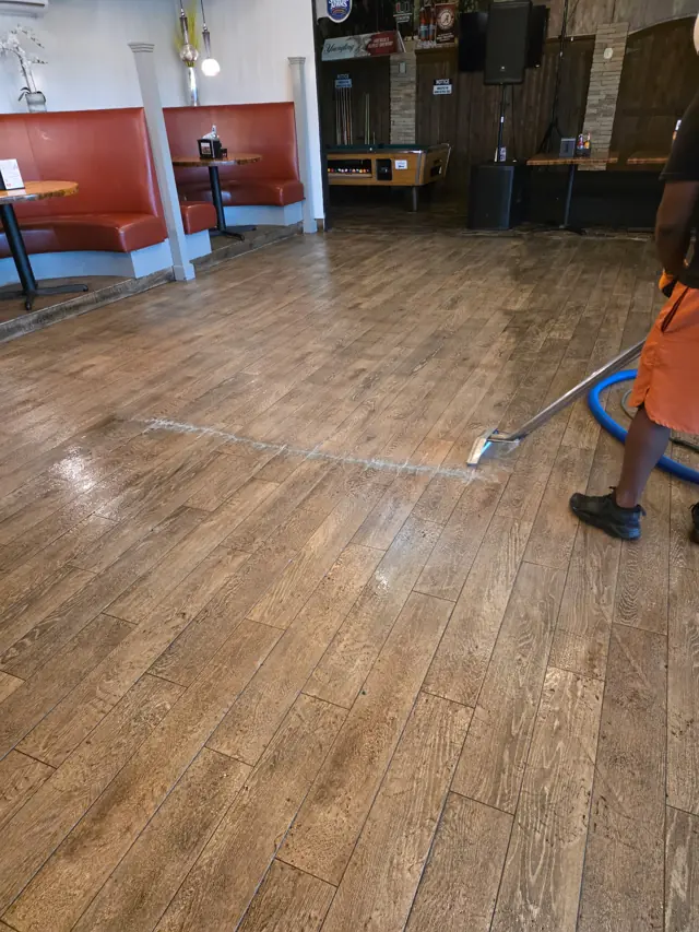 Our technician working a restaurant floor with the extraction wand